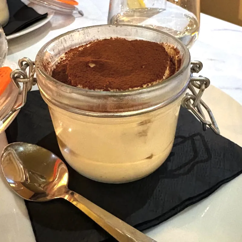 Homemade tiramisù in a glass jar